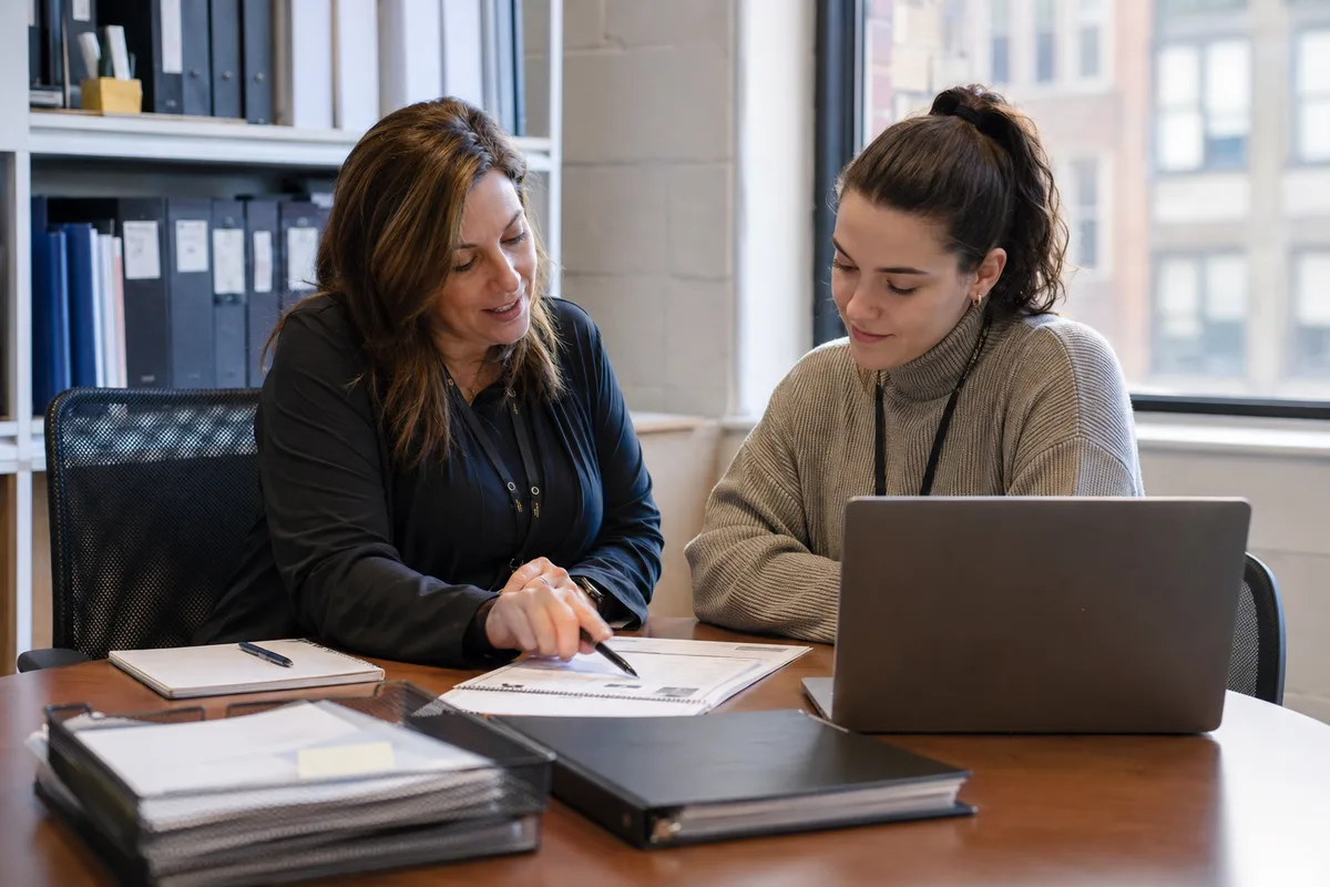 administrator guiding a practical employee onboarding step